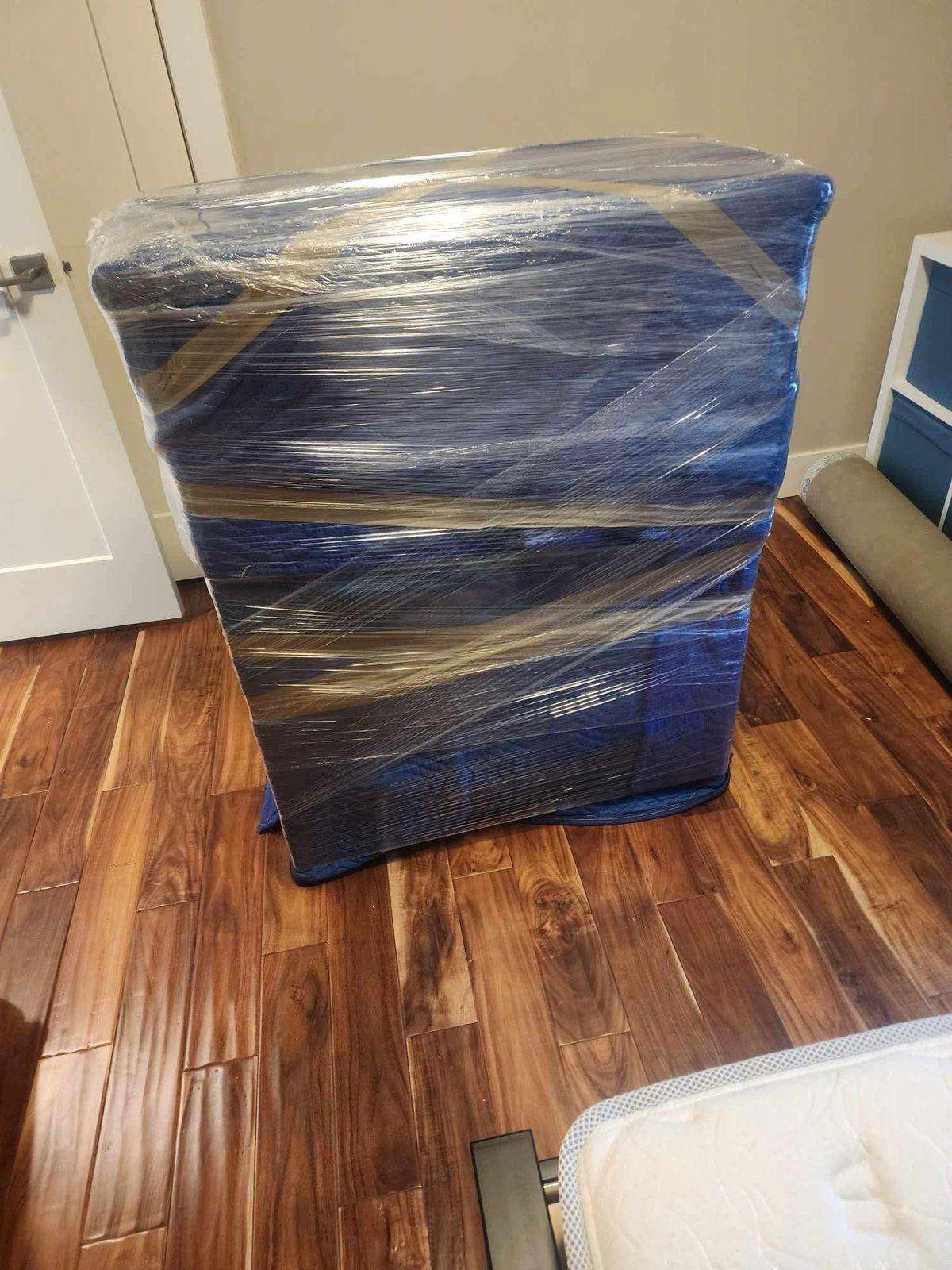 alt="Very well protected heavy furniture ready to be moved"
